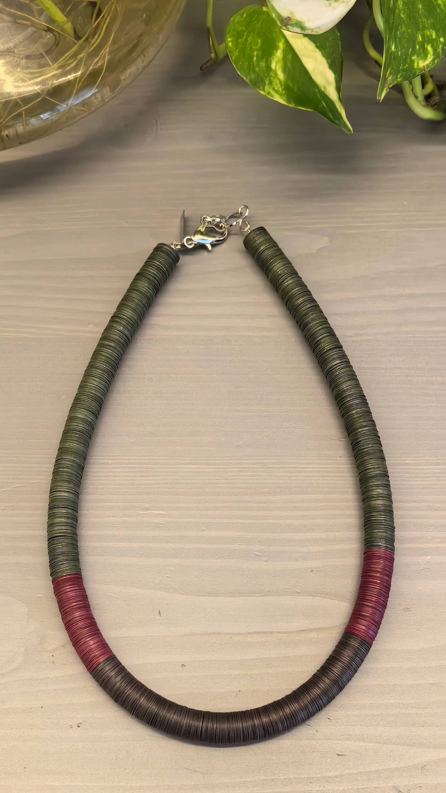 Green, burgundy, and brown round necklace