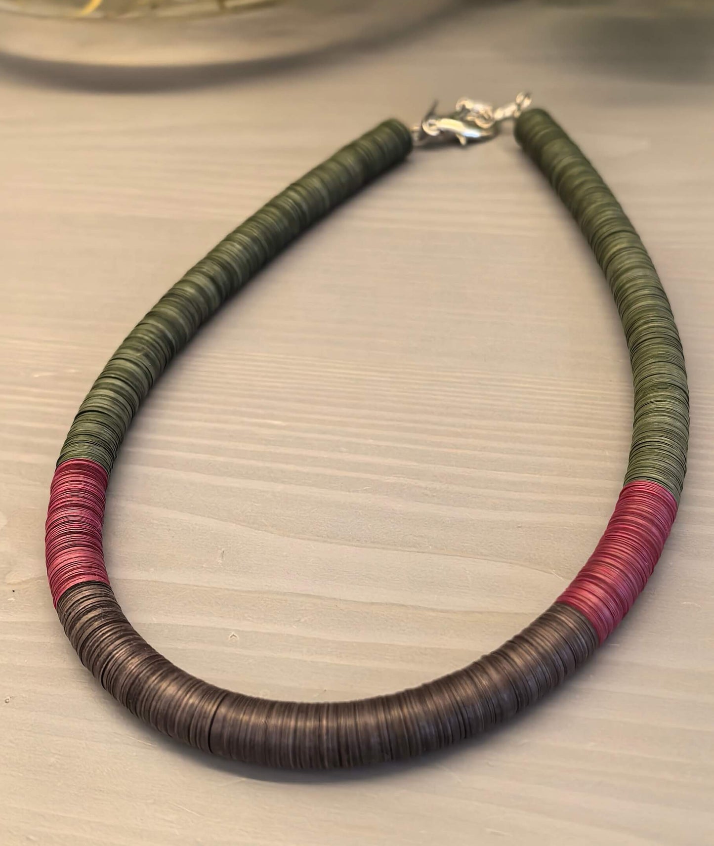 Green, burgundy, and brown round necklace